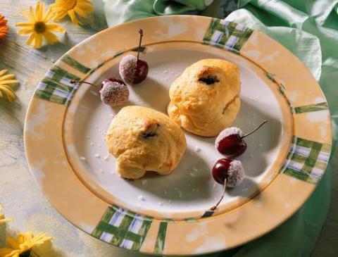 Überbackene Pfirsiche mit Topfenhaube