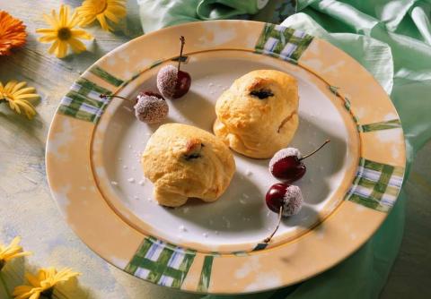 Überbackene Pfirsiche mit Topfenhaube Rezept - Rezept & Bild